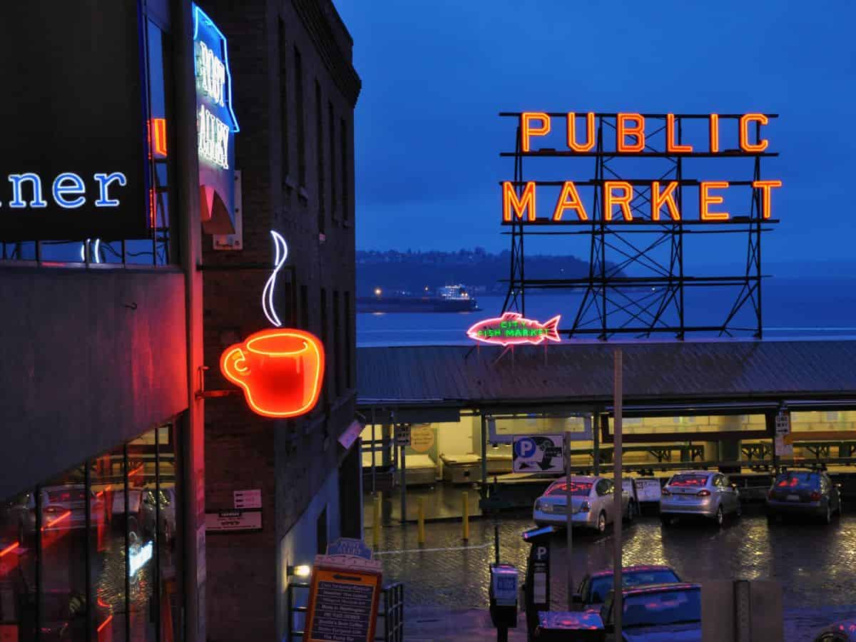 Photograph - seattle public market at dusk by robert mcdonald.