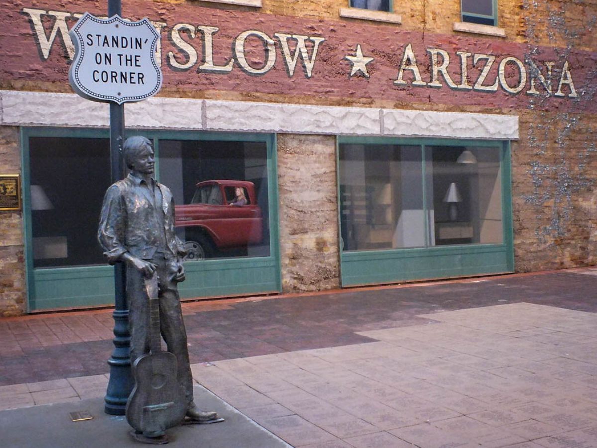 A statue of a man with a guitar on a corner in Winslow, Arizona, along old Route 66.