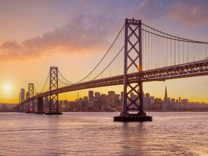 San Francisco and a bridge at sunset.